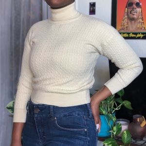 Cream colored 100% wool turtleneck by Carrol Reed